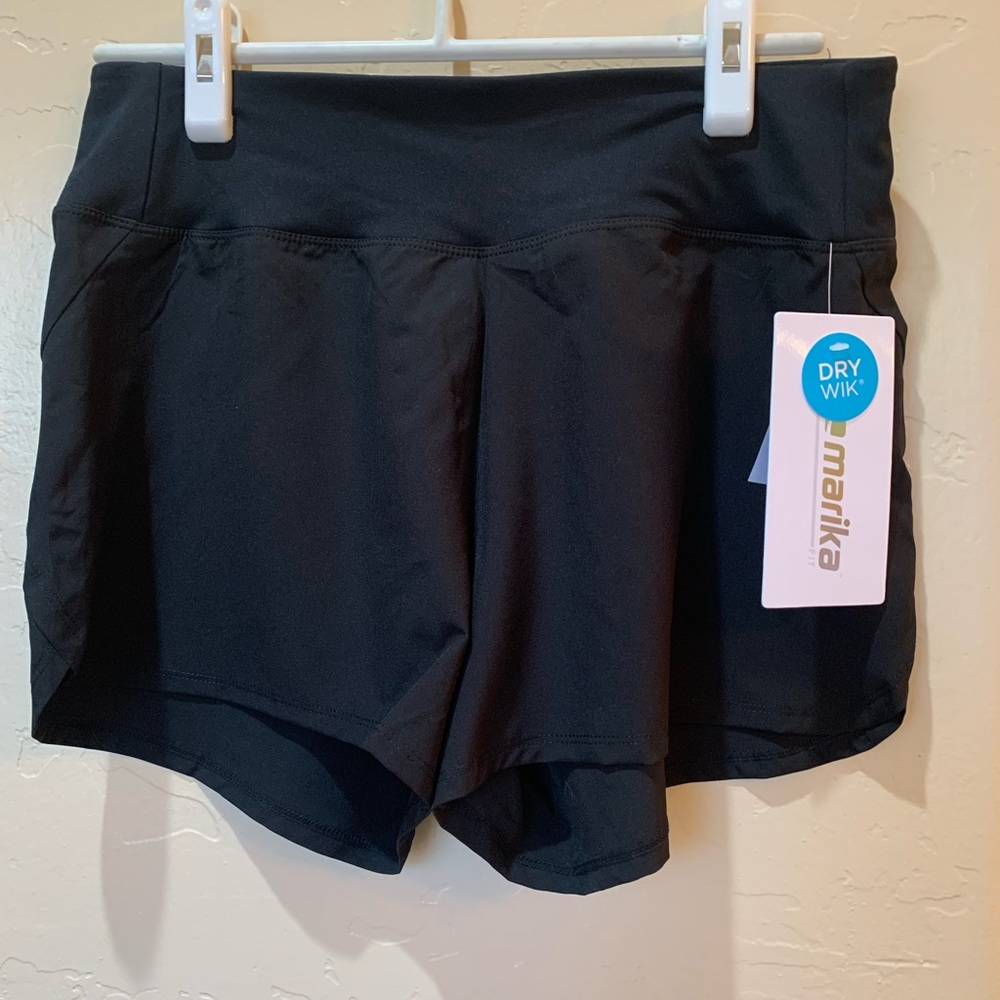 Black athletic-style shorts, size small, NWT